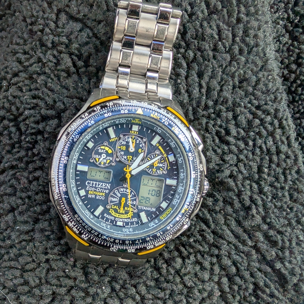 Citizen Yellow and Silver Watch with Stainless Steel Design